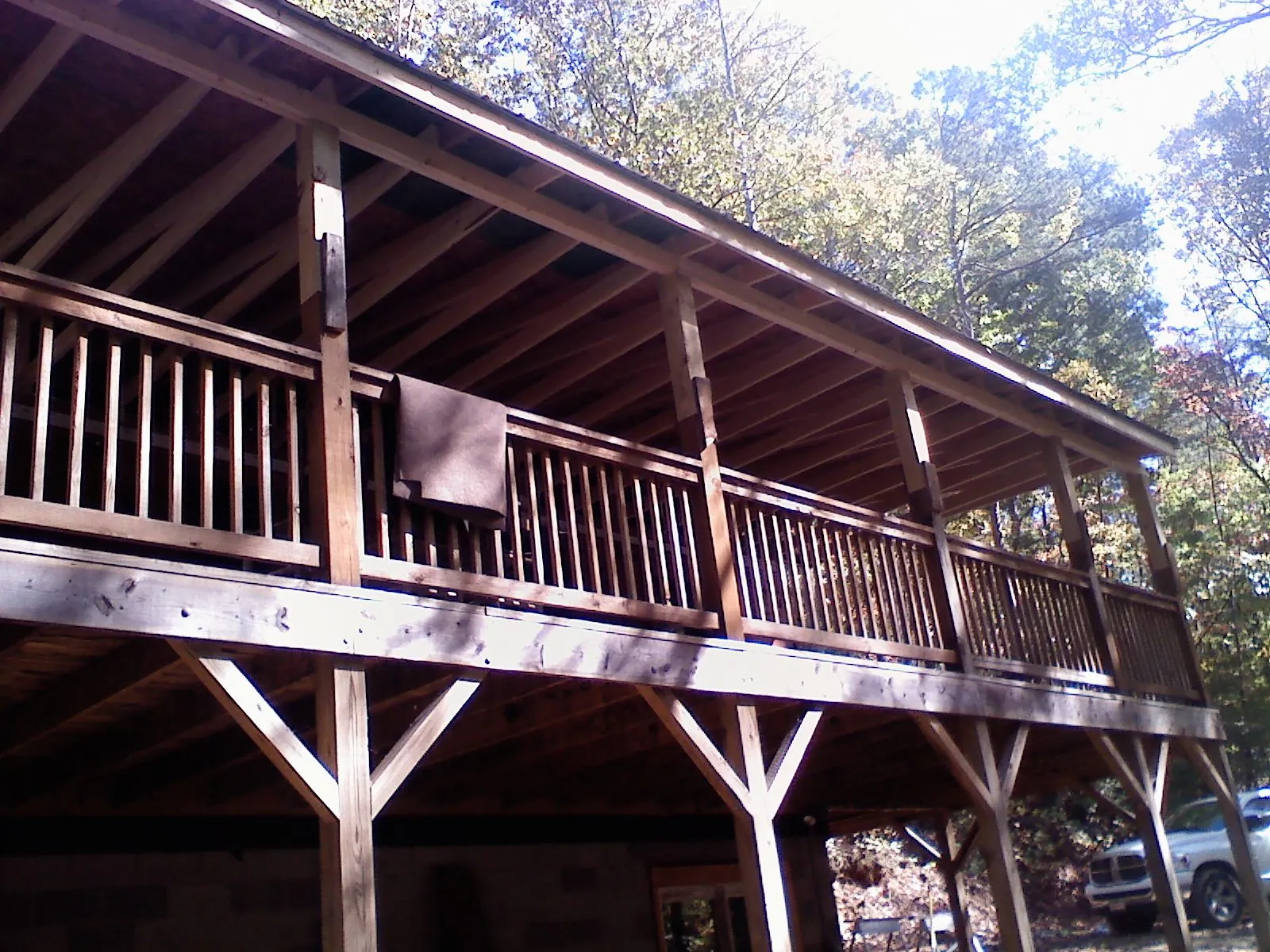 Timber framing under a new elevated porch and deck — Roof Leak Repair in Prosperity by Roofing Brothers